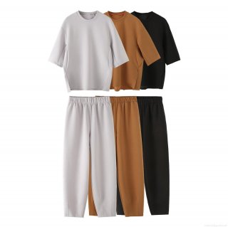 Women's Casual 2 Piece Set Minimalist Round Neck Drop Shoulder Half Sleeve T-Shirt and High Waist Elastic Long Pants Solid Color Loungewear Set